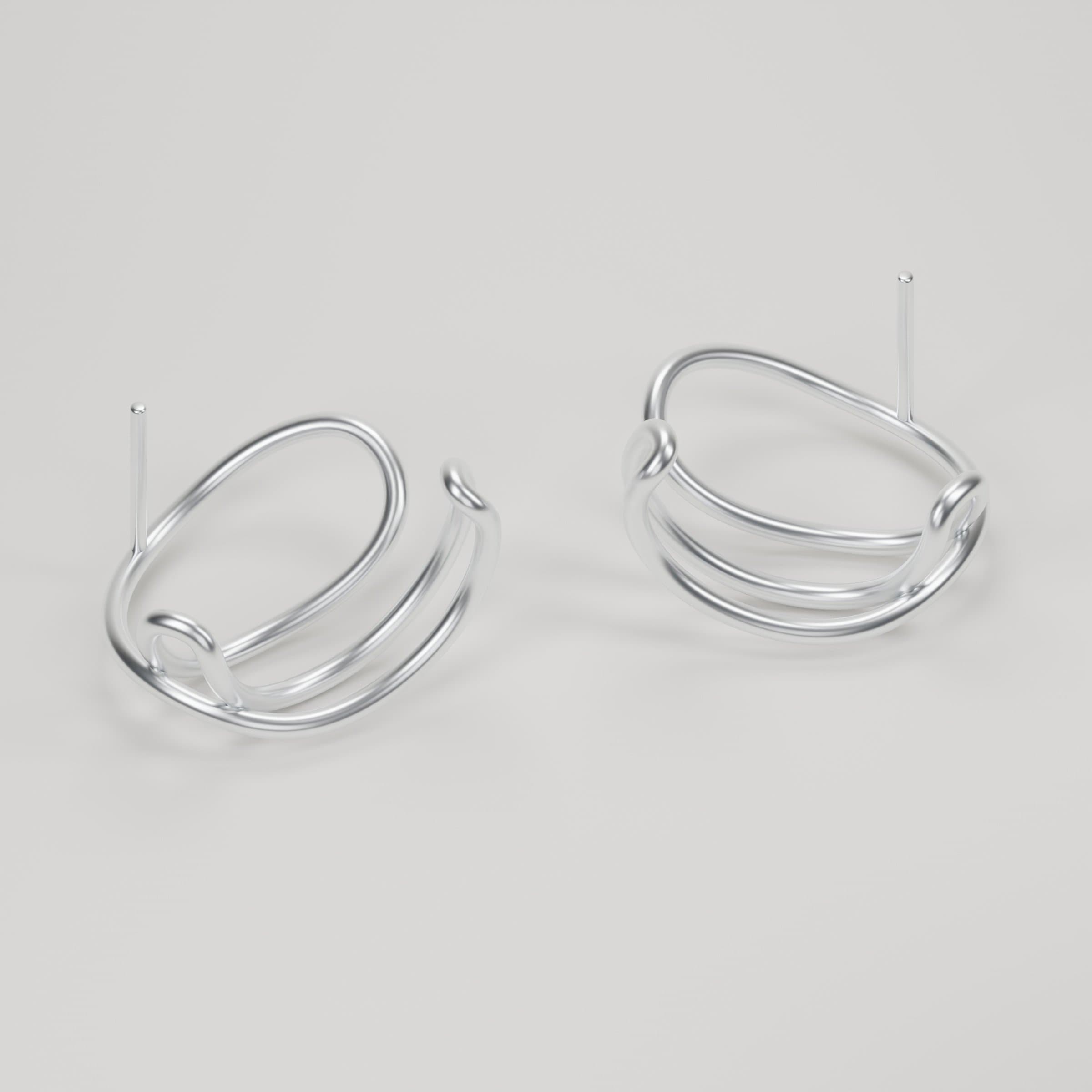Aria in Sterling Silver: the pair lying flat